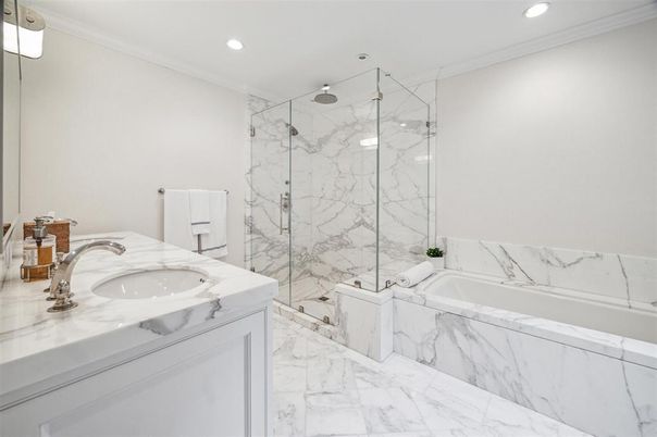 Bathroom, Dual Sink Vanities, Glass Shower, Interior, Marble, Marble Walls, Recessed Lighting