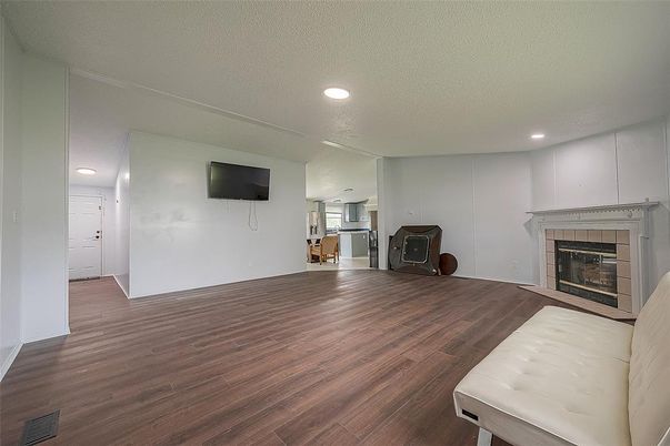 Empty room, Fireplace, Interior, Recessed Lighting, Wood Texture Flooring