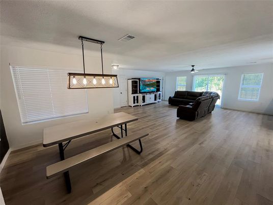 Dining room, Interior, Living room, Pendant Lights, Wood Texture Flooring