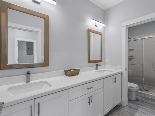 Bathroom, Dual Sink Vanities, Glass Shower, Interior, Wood Texture Flooring