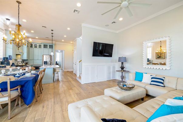 Chandelier, Dining room, Interior, Kitchen, Living room, Pendant Lights, Recessed Lighting, Stainless Steel Appliances, Wood Texture Flooring