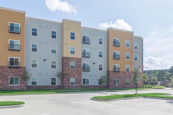 Exterior, Facade, Brick Facade, Condo Building