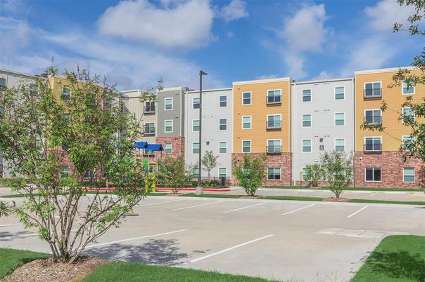 Exterior, Facade, Brick Facade, Condo Building