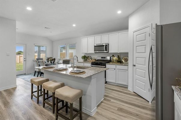 Dining room, Interior, Kitchen, Recessed Lighting, Stainless Steel Appliances, Wood Texture Flooring