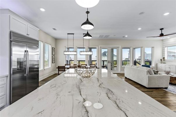 Dining room, Interior, Kitchen, Living room, Pendant Lights, Recessed Lighting, Stainless Steel Appliances, Wood Texture Flooring