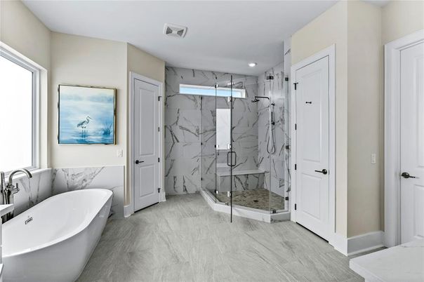 Bathroom, Free Standing Baths, Glass Shower, Interior, Marble, Marble Walls, Recessed Lighting