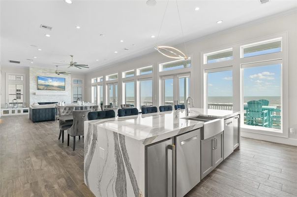 Dining room, Interior, Kitchen, Living room, Pendant Lights, Recessed Lighting, Water, Wood Texture Flooring