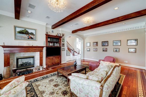 Chandelier, Fireplace, Interior, Living room, Recessed Lighting, Wooden Beams, Wood Texture Flooring