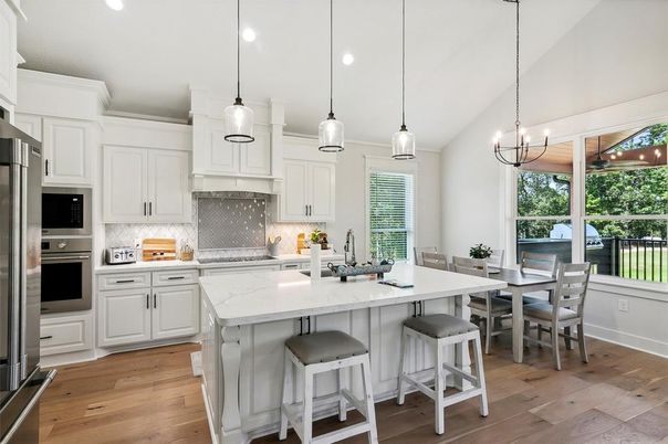 Dining room, Interior, Kitchen, Pendant Lights, Recessed Lighting, Stainless Steel Appliances, Wood Texture Flooring