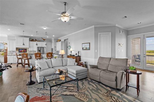 Dining room, Interior, Kitchen, Living room, Pendant Lights, Recessed Lighting, Stainless Steel Appliances, Wood Texture Flooring