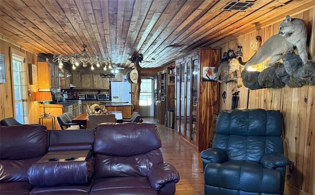 Chandelier, Dining room, Interior, Kitchen, Living room, Wooden Ceilings, Wood Texture Flooring, Wooden Walls