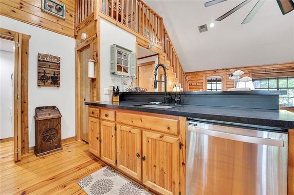 Interior, Kitchen, Recessed Lighting, Stainless Steel Appliances, Wood Texture Flooring, Wooden Walls