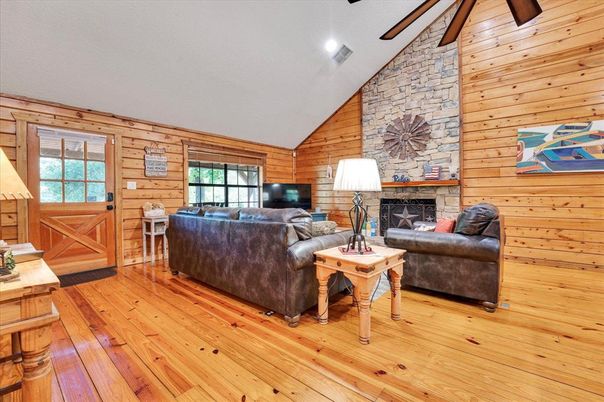 Fireplace, Interior, Living room, Recessed Lighting, Stone Walls, Wood Texture Flooring, Wooden Walls