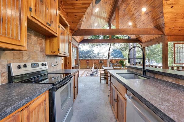 Dining room, Interior, Kitchen, Recessed Lighting, Stainless Steel Appliances, Stone Walls, Wooden Beams, Wooden Ceilings