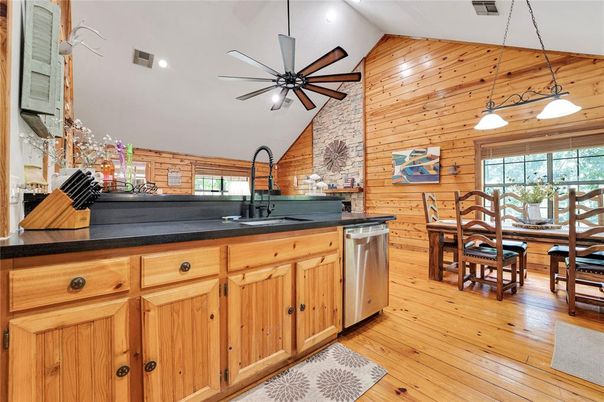 Dining room, Interior, Kitchen, Pendant Lights, Recessed Lighting, Stone Walls, Wood Texture Flooring, Wooden Walls