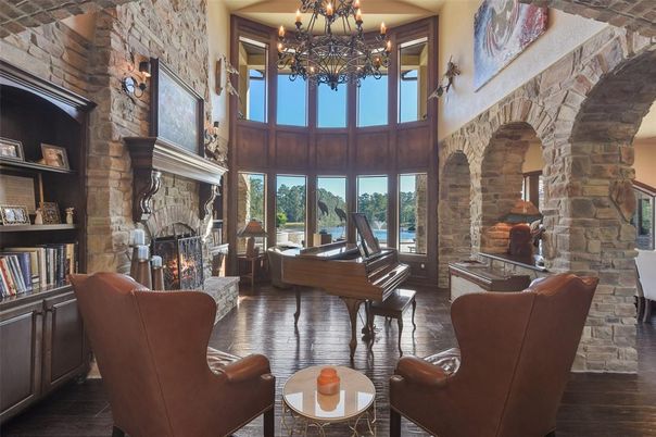 Chandelier, Fireplace, Interior, Living room, Piano, Stone Walls, Wood Texture Flooring