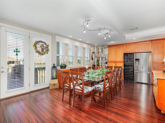 Dining room, Interior, Kitchen, Recessed Lighting, Stainless Steel Appliances, Wood Texture Flooring
