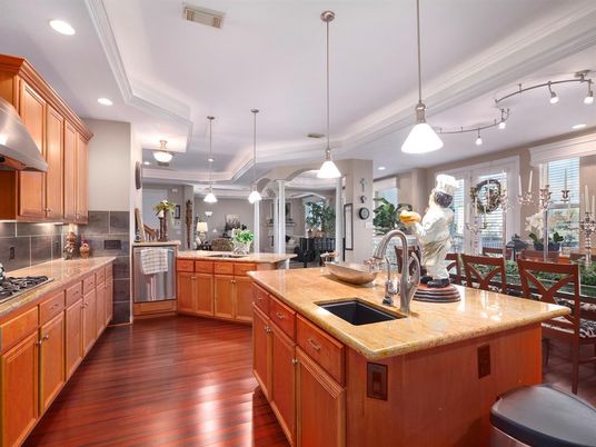 Dining room, Interior, Kitchen, Pendant Lights, Recessed Lighting, Stainless Steel Appliances, Wood Texture Flooring