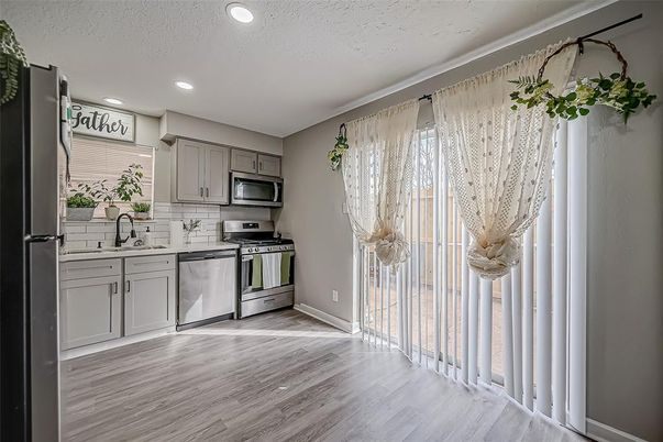 Interior, Kitchen, Recessed Lighting, Stainless Steel Appliances, Wood Texture Flooring