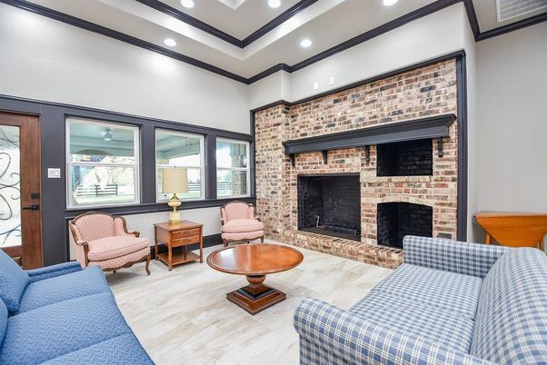 Fireplace, Interior, Living room, Recessed Lighting, Stone Walls, Wood Texture Flooring