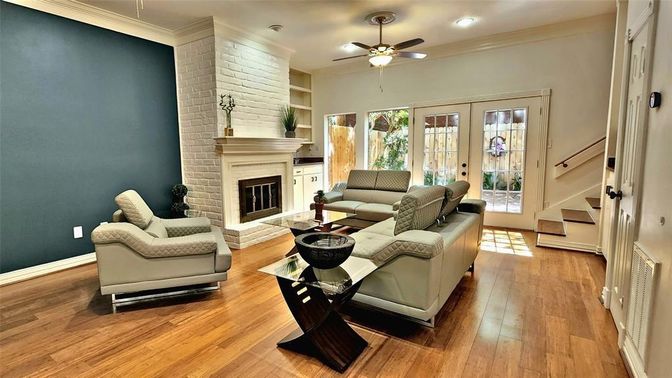 Fireplace, Interior, Living room, Recessed Lighting, Stone Walls, Wood Texture Flooring