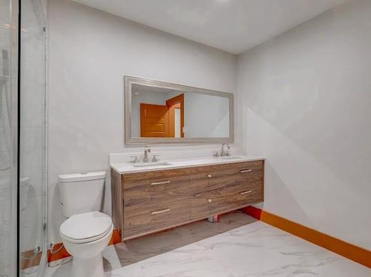 Bathroom, Dual Sink Vanities, Glass Shower, Interior, Marble, Recessed Lighting