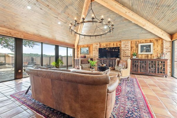 Chandelier, Fireplace, Interior, Living room, Recessed Lighting, Stone Walls, Wooden Beams, Wooden Ceilings, Wooden Walls