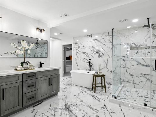 Bathroom, Dual Sink Vanities, Free Standing Baths, Glass Shower, Interior, Marble, Marble Walls, Recessed Lighting
