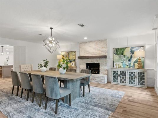 Dining room, Fireplace, Interior, Pendant Lights, Recessed Lighting, Stone Walls, Wood Texture Flooring