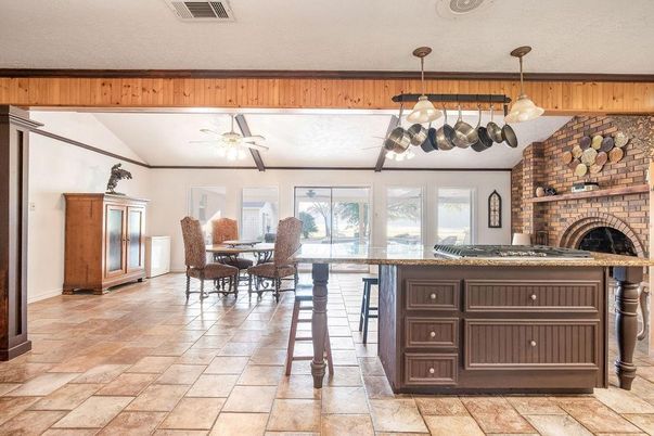 Dining room, Fireplace, Interior, Pendant Lights, Stone Walls