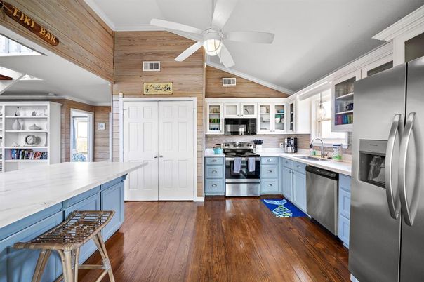 Interior, Kitchen, Stainless Steel Appliances, Wood Texture Flooring, Wooden Walls