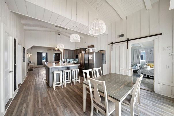 Dining room, Interior, Kitchen, Pendant Lights, Stainless Steel Appliances, Wood Texture Flooring