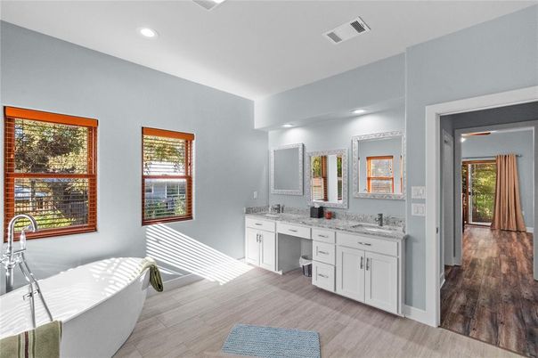 Bathroom, Dual Sink Vanities, Free Standing Baths, Interior, Recessed Lighting, Wood Texture Flooring