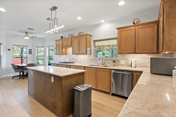 Dining room, Interior, Kitchen, Pendant Lights, Recessed Lighting, Stainless Steel Appliances, Wood Texture Flooring