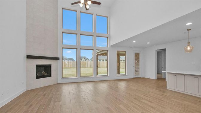 Empty room, Fireplace, Interior, Pendant Lights, Recessed Lighting, Wood Texture Flooring