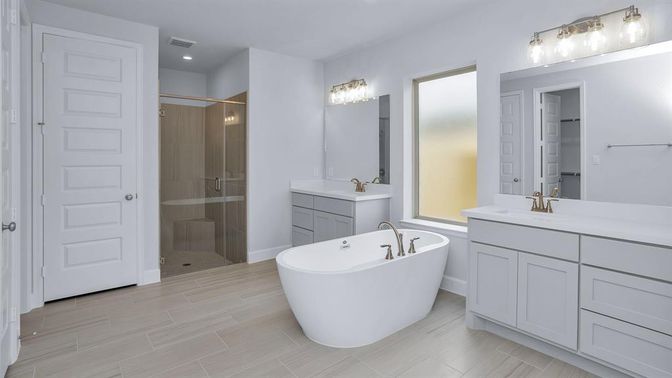 Bathroom, Dual Sink Vanities, Free Standing Baths, Glass Shower, Interior, Recessed Lighting, Wood Texture Flooring