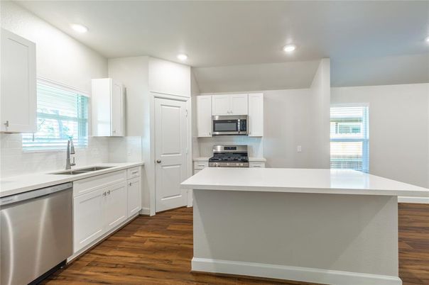 Interior, Kitchen, Recessed Lighting, Stainless Steel Appliances, Wood Texture Flooring