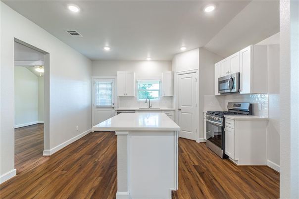 Interior, Kitchen, Recessed Lighting, Stainless Steel Appliances, Wood Texture Flooring
