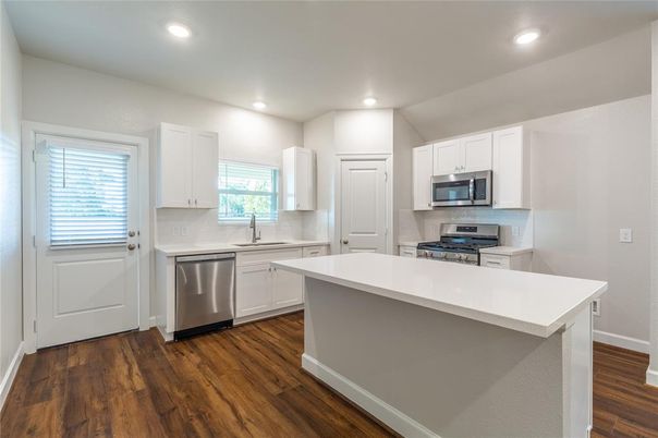 Interior, Kitchen, Recessed Lighting, Stainless Steel Appliances, Wood Texture Flooring