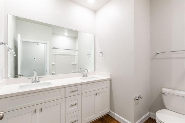 Bathroom, Dual Sink Vanities, Interior, Recessed Lighting, Wood Texture Flooring