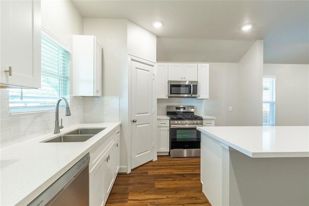 Interior, Kitchen, Recessed Lighting, Stainless Steel Appliances, Wood Texture Flooring
