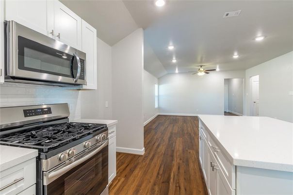 Interior, Kitchen, Recessed Lighting, Stainless Steel Appliances, Wood Texture Flooring