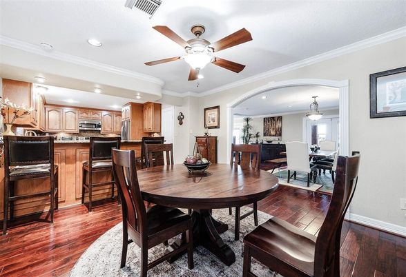 Dining room, Interior, Kitchen, Pendant Lights, Recessed Lighting, Stainless Steel Appliances, Wood Texture Flooring