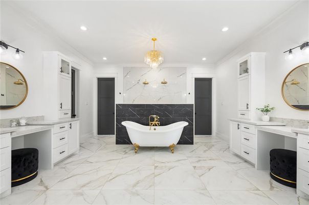Bathroom, Chandelier, Dual Sink Vanities, Free Standing Baths, Interior, Marble, Marble Walls, Recessed Lighting