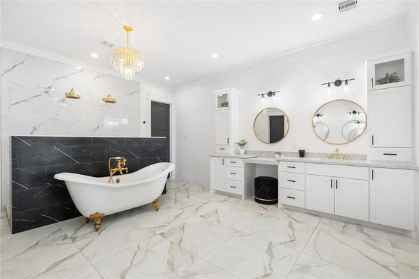 Bathroom, Chandelier, Dual Sink Vanities, Free Standing Baths, Interior, Marble, Marble Walls, Recessed Lighting