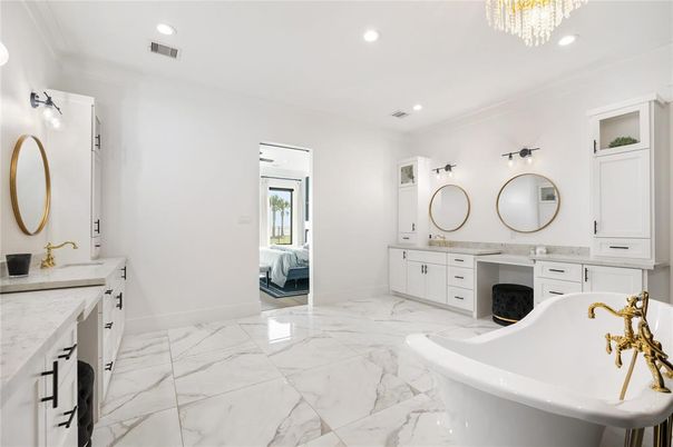 Bathroom, Chandelier, Dual Sink Vanities, Free Standing Baths, Interior, Marble, Recessed Lighting