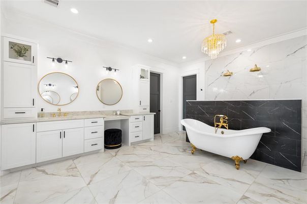 Bathroom, Chandelier, Dual Sink Vanities, Free Standing Baths, Interior, Marble, Marble Walls, Recessed Lighting