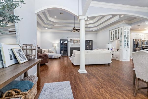 Fireplace, Interior, Kitchen, Living room, Recessed Lighting, Stainless Steel Appliances, Wood Texture Flooring