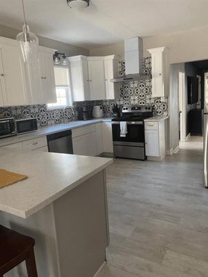 Interior, Kitchen, Pendant Lights, Stainless Steel Appliances, Wood Texture Flooring