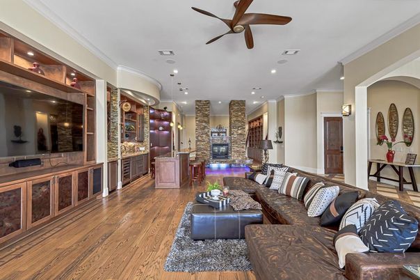Fireplace, Interior, Living room, Recessed Lighting, Stone Walls, Wood Texture Flooring